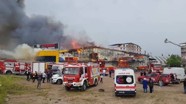 Kocaeli'de markette yangın çıktı: Bekçi dumandan etkilendi